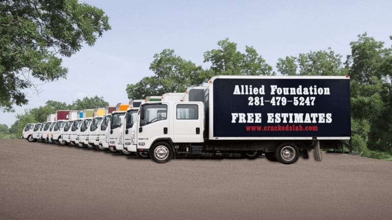 a long line of trucks parked on the side of a road