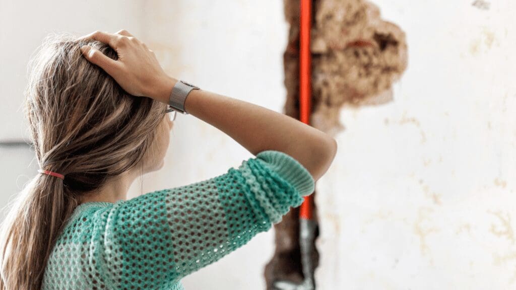 a woman with her hair in a ponytail