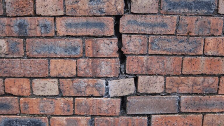 a close up of a brick wall made of bricks