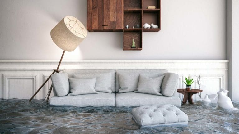 a living room filled with furniture and a lamp