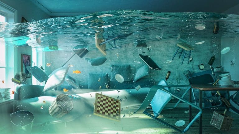 a room filled with lots of furniture under water