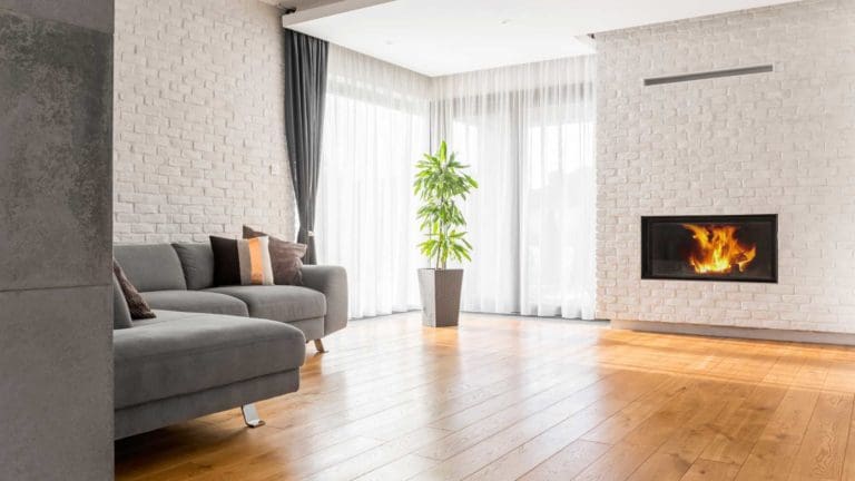 a living room with a couch and a fire place